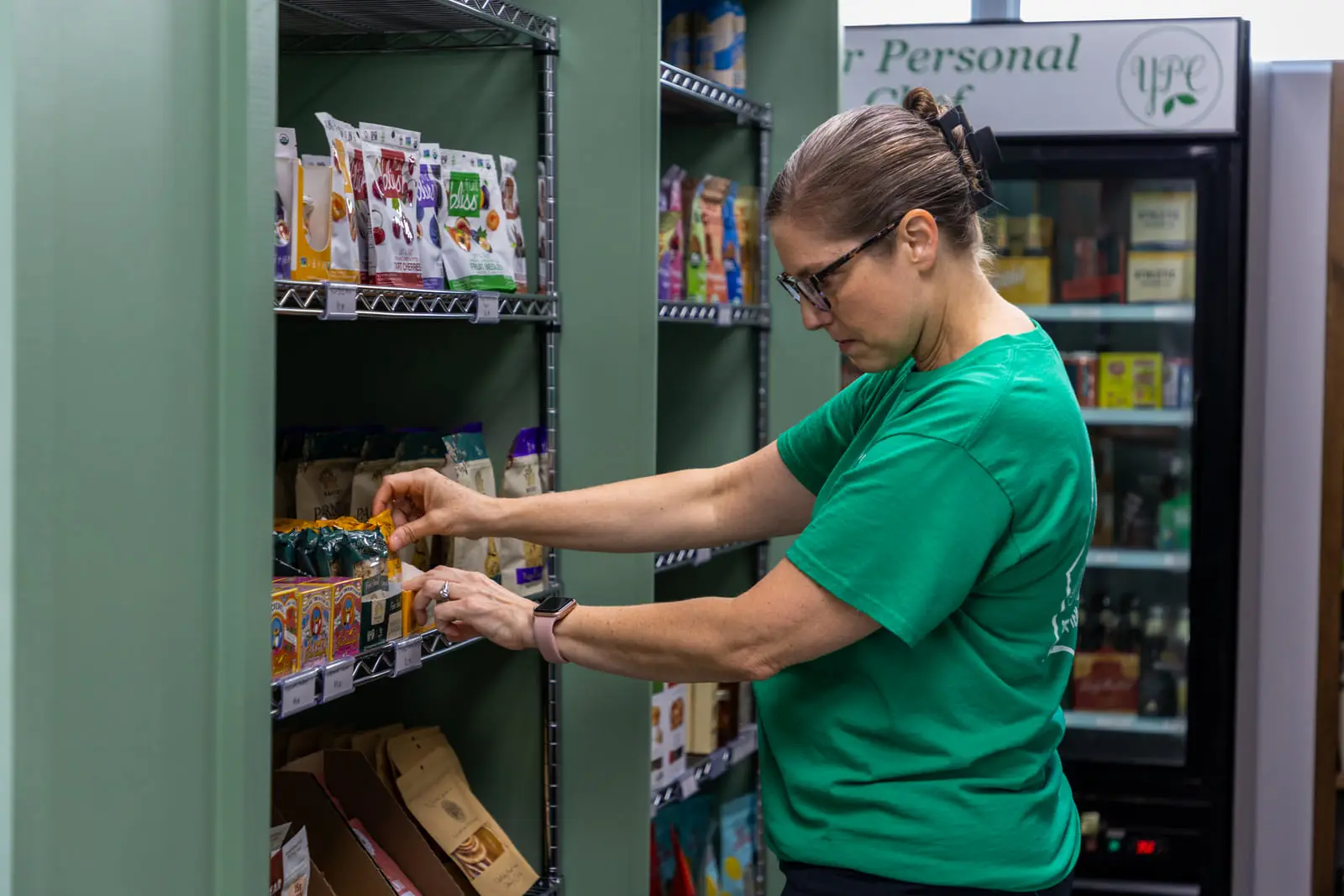 The market shelves and cold case at YPC Market in Aledo